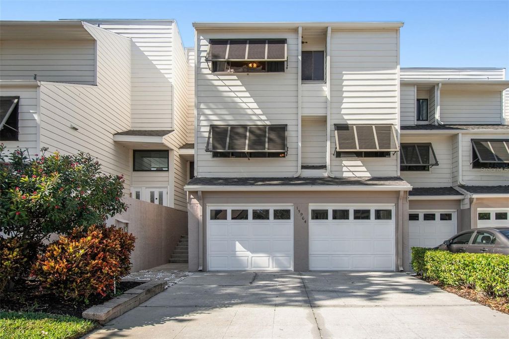 Photo of 13964 Lake Point Drive, Clearwater, FL 33762 (MLS # TB8442515)