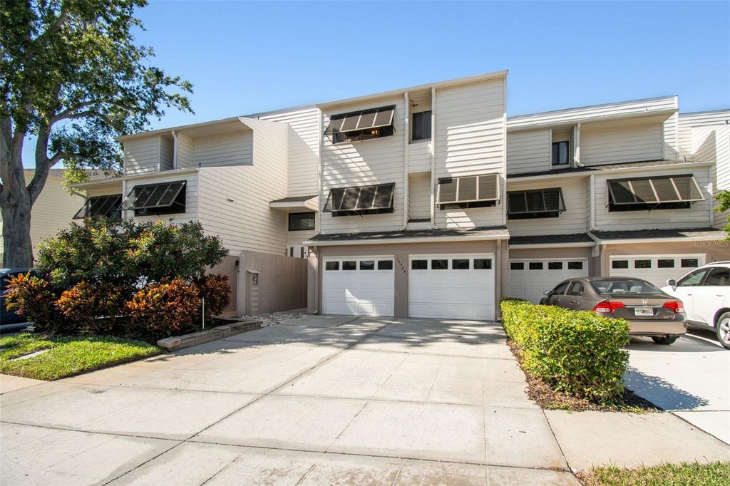 Photo of 13964 Lake Point Drive, Clearwater, FL 33762 (MLS # TB8442515)