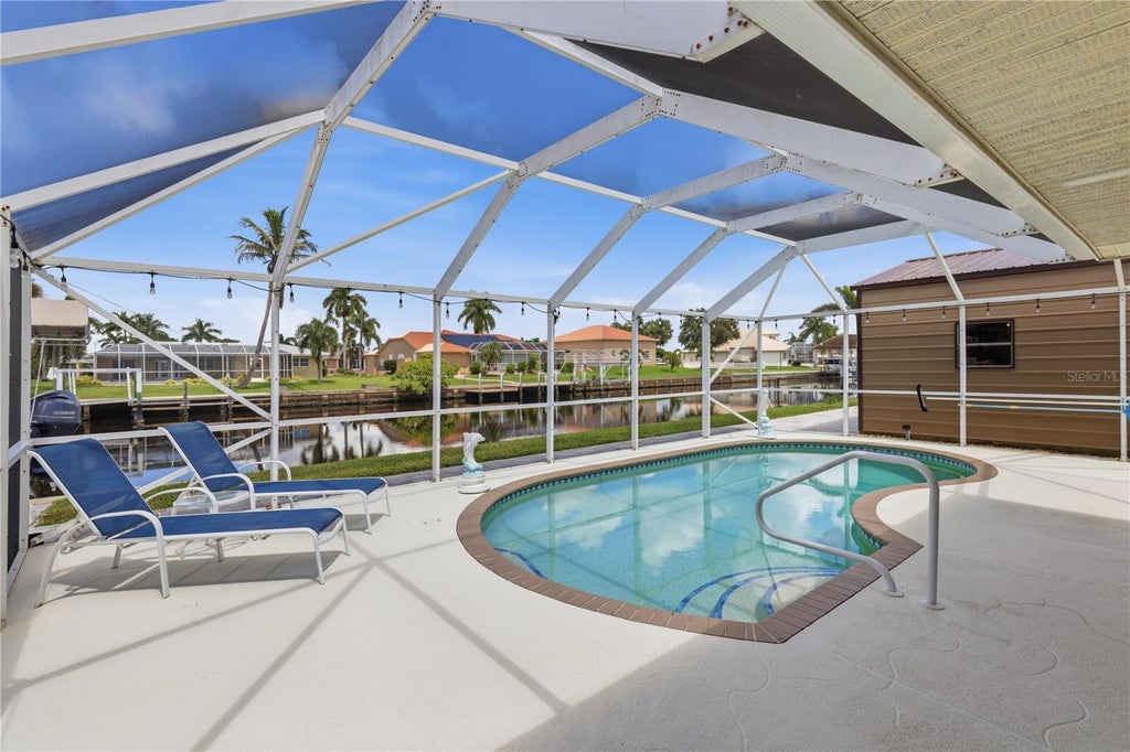 Photo of 136 Sinclair Street SE, Port Charlotte, FL 33952 (MLS # D6148556)