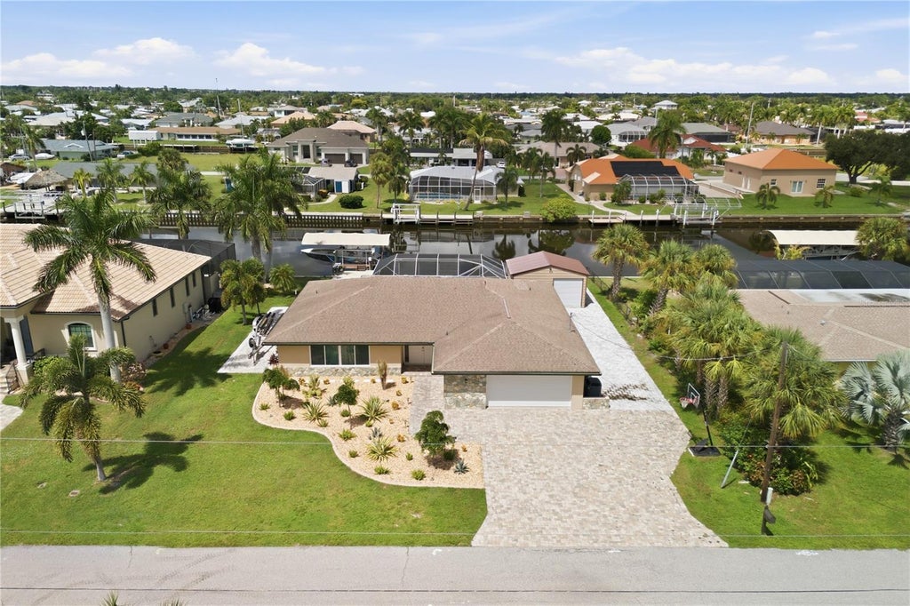 Photo of 136 Sinclair Street SE, Port Charlotte, FL 33952 (MLS # D6148556)