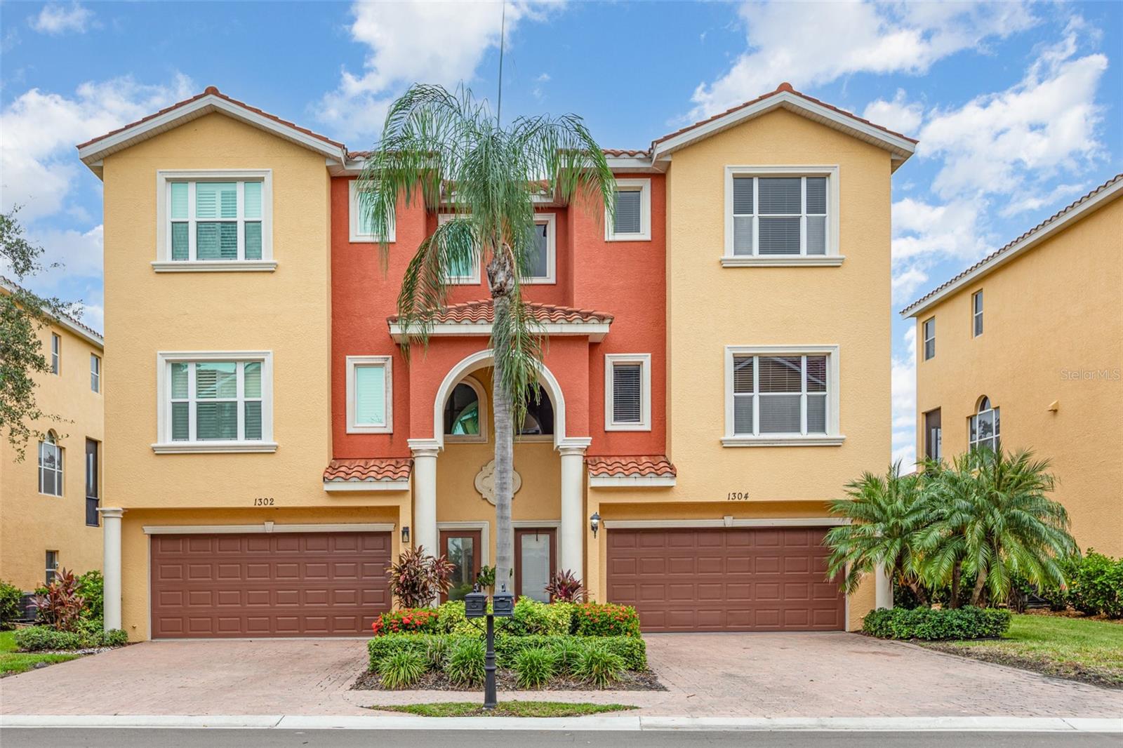 Waterfront Living at Riviera Dunes.
Just moments from the shimmering Manatee River and complete with your own boat slip in a
protected marina, this exceptional residence is a dream come true for boaters and water
enthusiasts. Imagine setting out on turquoise waters, the breeze in your hair, and the occasional
glimpse of dolphins surfacing nearby—all with the convenience of docking your vessel just steps
from home.
This innovative three-story residence is designed for both comfort and style, complete with a
private elevator, a two-car garage, and multiple balconies that capture serene views and soft
coastal breezes. The middle level showcases an inviting open-concept layout, where natural light
flows effortlessly through expansive sliding doors. The living and dining areas open to a
balcony, creating a seamless indoor-outdoor lifestyle perfect for quiet mornings, al fresco dining,
or evenings spent enjoying the sound of rustling palms.
The chef’s kitchen is as functional as it is beautiful, offering rich solid-wood cabinetry, gleaming
granite countertops, and ample space to create and gather.
On the top floor, the private primary suite becomes your personal sanctuary. Sliding doors open
to a balcony with tranquil views, while the ensuite bath features dual vanities, a soaking tub, and
a spacious walk-in closet. Two additional bedrooms and bathrooms provide flexibility for family,
guests, or a home office.
Life at Riviera Dunes extends beyond your front door. Residents enjoy scenic walking paths, two
sparkling pools, tennis and pickleball courts, a fitness center, and peaceful spots along the marina
to take in the sunset.
With its perfect blend of elegance, comfort, and unmatched access to the water, this home makes
every day feel like a vacation.