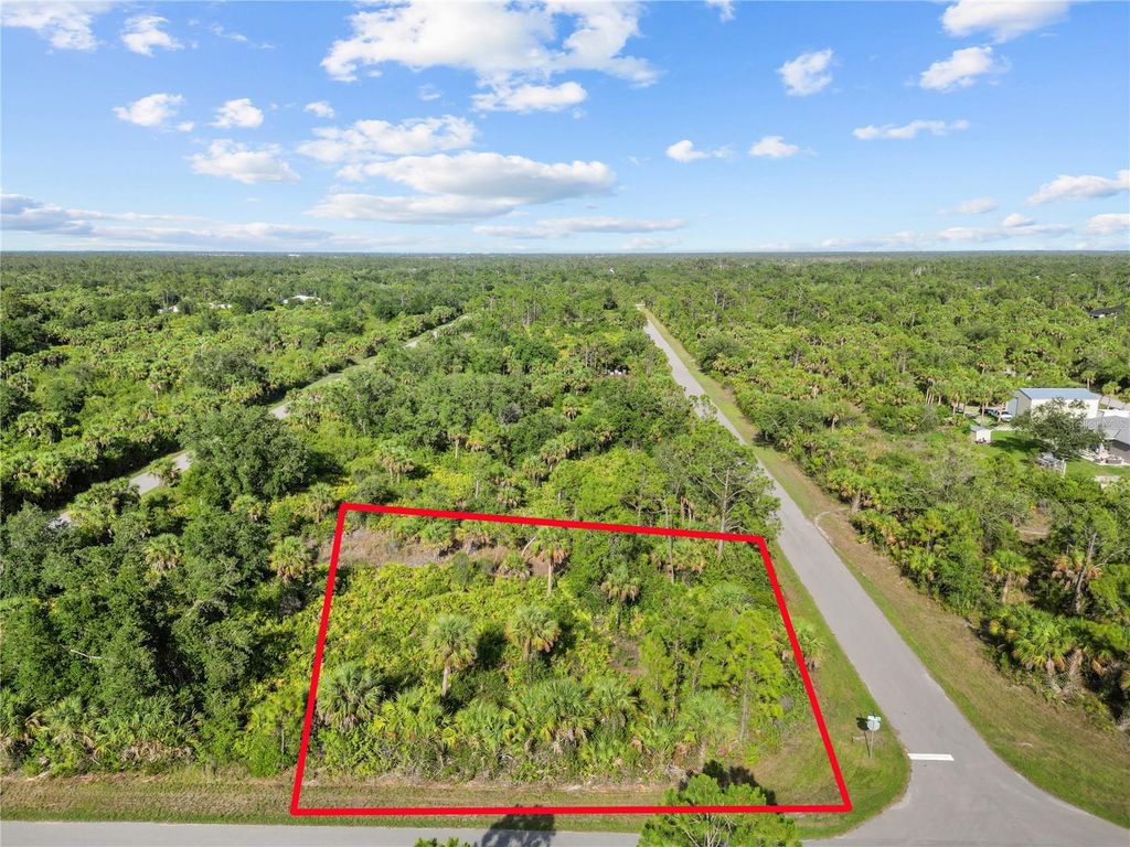 Photo of 14114 Carney Avenue, Port Charlotte, FL 33953 (MLS # TB8395778)