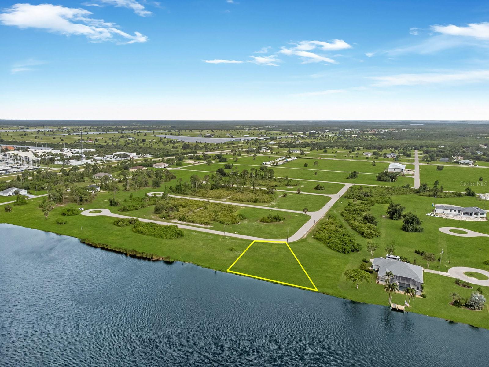 Build the Florida home of your dreams on this exceptional vacant lot tucked within a quiet community in the heart of Placida. With beautiful lake views and surrounded by serene natural landscapes, this property offers the perfect canvas to create your own slice of paradise. Imagine waking up to gentle breezes and evenings spent enjoying peaceful surroundings, with very few neighbors—just you and your vision. The lot provides ample space for a custom build, pool, garden, and outdoor oasis, whatever your heart desires.
Set just minutes from the charm of Boca Grande and the sandy retreat of Manasota Key, you'll never be far from sun-soaked beaches, boutique shopping, or a fresh seafood dinner. Adventurers, Fishermen and boat lovers will appreciate the convenient proximity to Gasparilla Marina and multiple area boat ramps, while golfers can get their game on at one of 8 nearby Golf Courses. Located near multiple local restaurants with that outdoor Florida flare, featuring live music and fantastic eats, you will be pleasantly surprised by the atmosphere you find yourself in! This unique spot blends the calm of a comfortable neighborhood with accessibility to some of Southwest Florida’s favorite destinations. Whether you're planning for your full-time residence, a vacation getaway, or long-term investment, the location offers a rare combination of peace and play. Your future oasis awaits—bring your plans, your imagination, and maybe a good pair of flip flops!