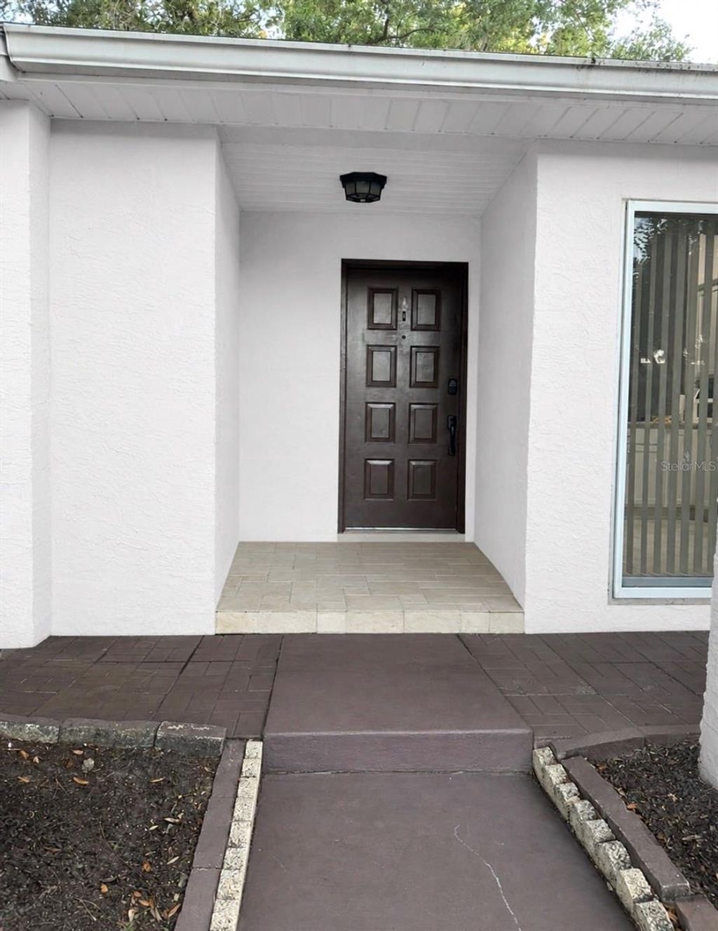 Photo of 925 Pebble Creek Circle, Orlando, FL 32824 (MLS # O6411428)
