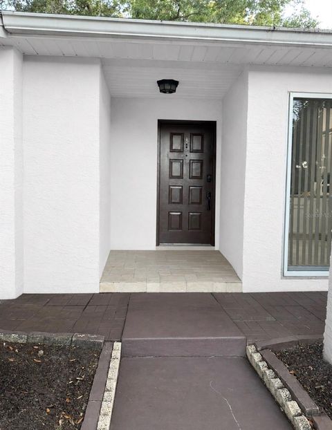 Photo of 925 Pebble Creek Circle, Orlando, FL 32824 (MLS # O6411428)