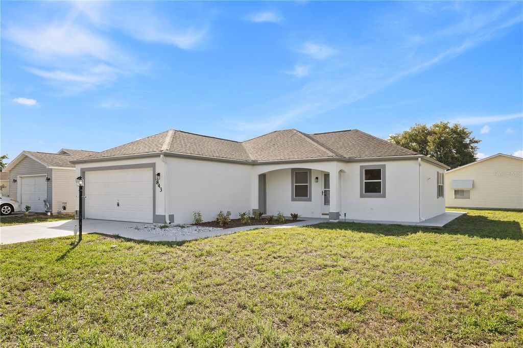 Photo of 843 Bolivar Street, Lady Lake, FL 32159 (MLS # TB8511597)