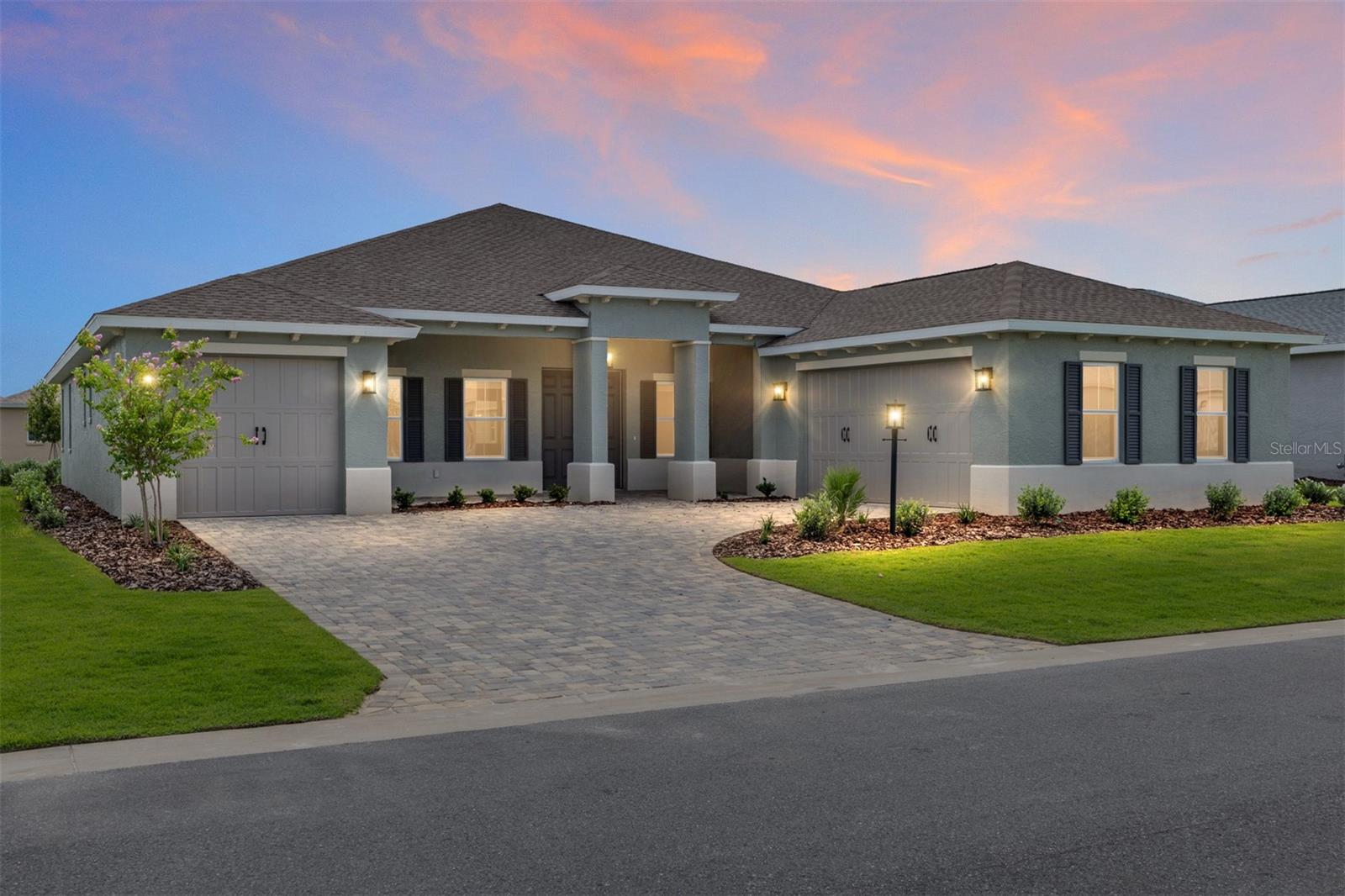 Welcome to the Aberdeen model in the desirable Balfour community at On Top of the World! This beautifully designed new construction home offers 3 bedrooms, 3 bathrooms, a flex room, and a 3-car split garage. The exterior features a paver driveway and walkway, along with elegant French entry doors that set the tone for what’s inside. Step into the open floor plan showcasing luxury vinyl flooring throughout the main living areas with tile in the bathrooms. A flex room with French doors at the front of the home provides the perfect space for a home office or den. The spacious living area features a 3-panel sliding glass door that opens to a screened lanai, extending your living space outdoors. The gourmet kitchen is a chef’s delight with a built-in oven and microwave, 5-burner cooktop with range hood, stainless steel refrigerator, walk-in pantry, large island, backsplash, quartz countertops, and under-cabinet lighting. The private owner’s suite is a retreat with French doors, five windows with blinds for abundant natural light, and a walk-in closet. The luxurious en suite includes his and her vanities with quartz counters, a zero-entry tiled shower with a built-in bench, and a linen closet. One guest bedroom also offers an en suite bathroom with a quartz vanity, a zero-entry tiled shower with a bench, and a walk-in closet. This home combines thoughtful design, modern finishes, and comfortable living—ready for you to make it your own.