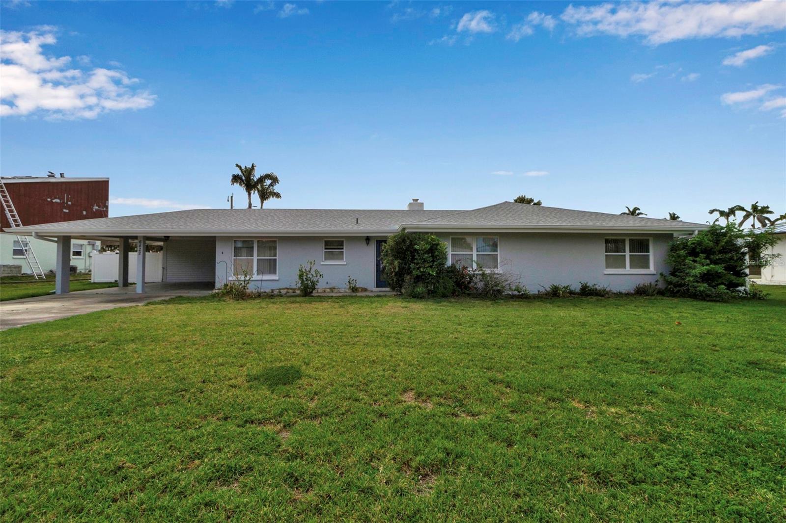 Move-In Ready Home – Minutes to Siesta Key! Nestled in the peaceful and desirable Pine Shores neighborhood, this beautifully updated single-family home offers the perfect blend of comfort, style, and location. Just moments from the world-renowned Siesta Key beaches and within walking or biking distance to a variety of shops and restaurants, this home captures the essence of Florida living. Step inside to a spacious open floor plan filled with abundant natural light, ideal for both everyday living and entertaining. The spacious great room features a wood-burning fireplace, creating a warm and inviting atmosphere. The updated kitchen boasts modern finishes, stainless steel appliances and plenty of storage. The Florida Room, which opens directly to the screened patio and sparkling pool, is perfect for enjoying sunny days and warm evenings. This home features three generously sized bedrooms and two beautifully updated bathrooms, providing comfort and privacy for family and guests. Situated on a large lot, there’s plenty of outdoor space to enjoy, whether you're relaxing by the pool or hosting a backyard barbecue. Additional highlights include a new roof (2022), a large air-conditioned storage room with washer and dryer, and a prime location in one of Sarasota’s most sought-after neighborhoods. Don't miss this move-in ready gem – your Florida dream home awaits in Pine Shores!