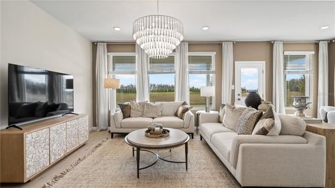 Tiny photo for 850 Tundra Loop, Groveland, FL 34736 (MLS # O6420259)