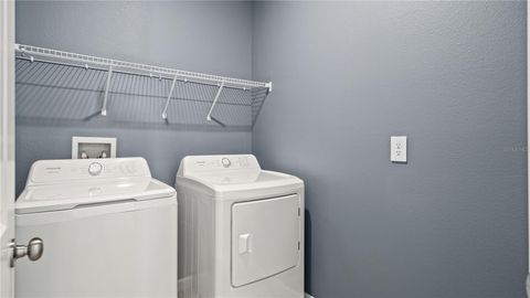 Tiny photo for 850 Tundra Loop, Groveland, FL 34736 (MLS # O6420259)