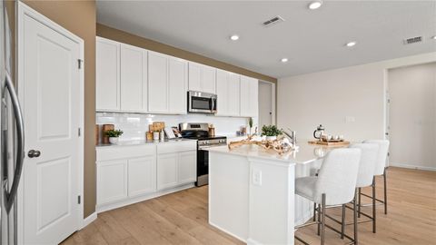 Tiny photo for 850 Tundra Loop, Groveland, FL 34736 (MLS # O6420259)