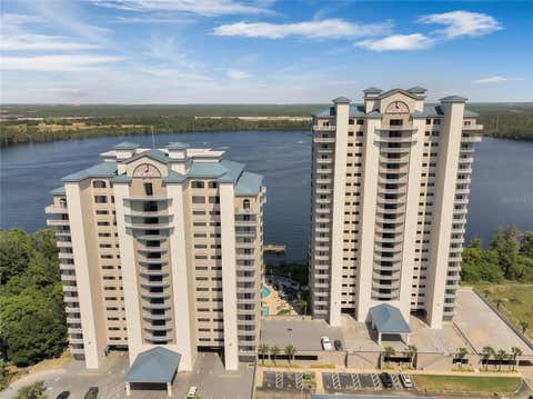 Photo of 13427 Blue Heron Beach Drive #301, Orlando, FL 32821 (MLS # O6411021)
