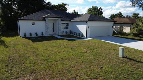 Photo of 1834 Tripoli Avenue, Deltona, FL 32725 (MLS # S5135186) Photo of 1834 Tripoli Avenue, Deltona, FL 32725 (MLS # S5135186)
