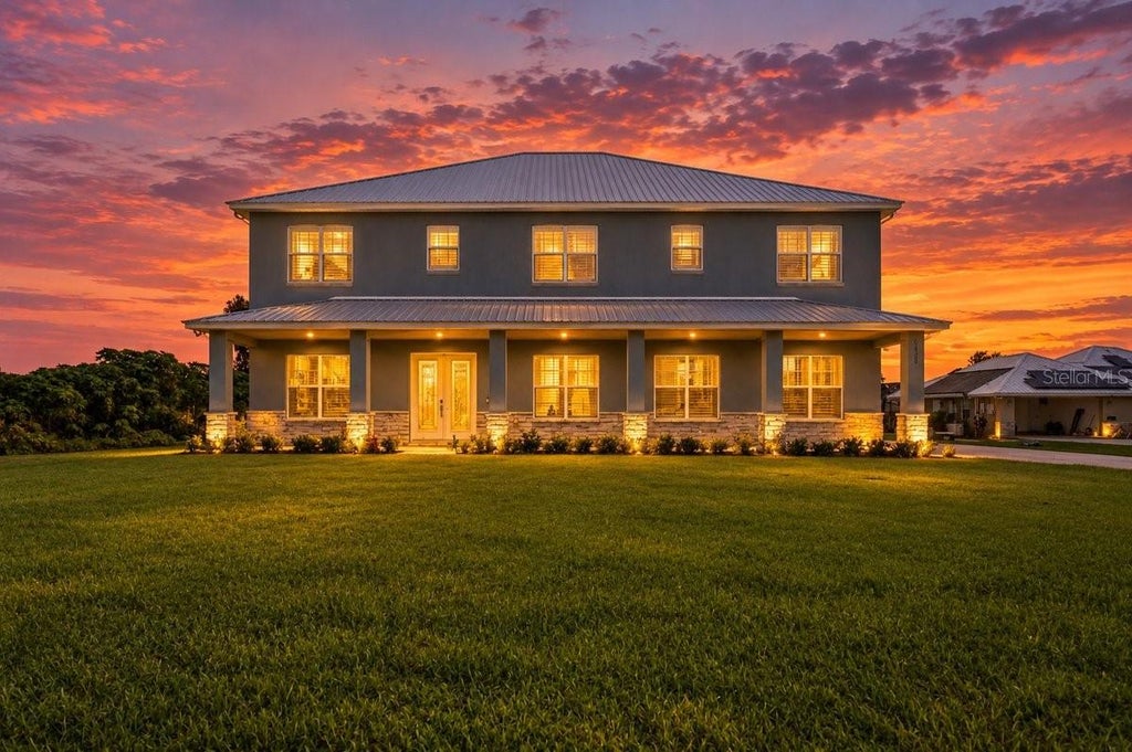 Photo of 4130 Polk City Road, Haines City, FL 33844 (MLS # P4939928)