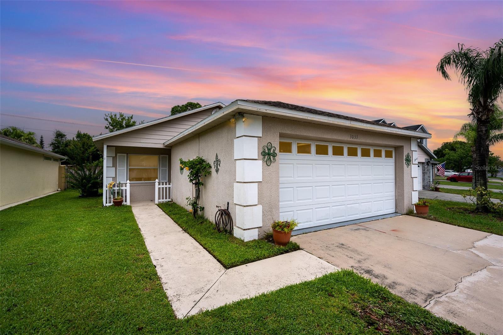Welcome to this well-maintained 2-bedroom, 2-bath home with a 2-car garage and a fully fenced yard. As you step inside, you’ll appreciate the bright, open layout. To your right, the kitchen overlooks the spacious dining and family room combo, creating a perfect space for entertaining and everyday living. The kitchen features ample cabinet and counter space along with a convenient closet pantry. The living room has direct access to the covered lanai through sliding glass doors, leading out to the private, fenced-in backyard ideal for relaxing, pets, or play. The primary bedroom includes an en-suite bath with a tiled shower and single vanity, while the additional bedroom has a hall bathroom. Community Pool and Tennis court. Conveniently located near Hwy 528, US Hwy 1, and I-95, with easy access to Kennedy Space Center, Orlando, shopping, and the beaches.