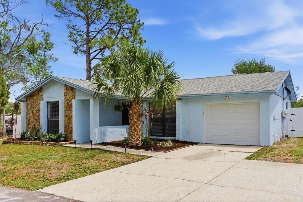 Photo of 7507 Woodland Oaks Court, Tampa, FL 33615 (MLS # W7885162)