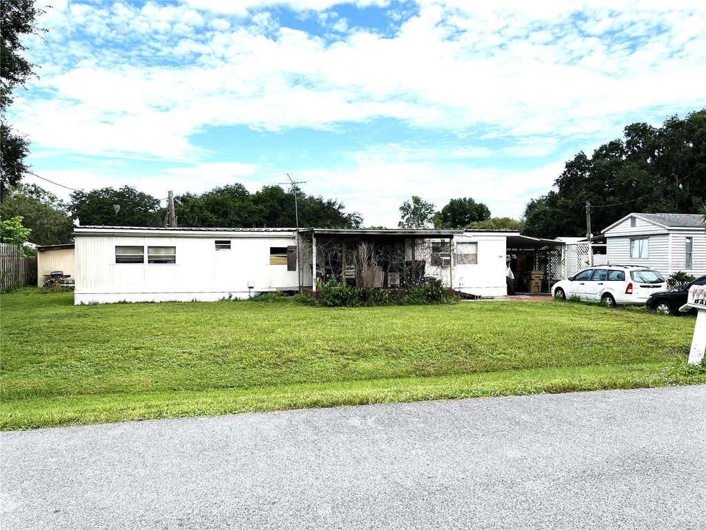 Photo of 170 N Oak Drive, Kenansville, FL 34739 (MLS # S5156112)