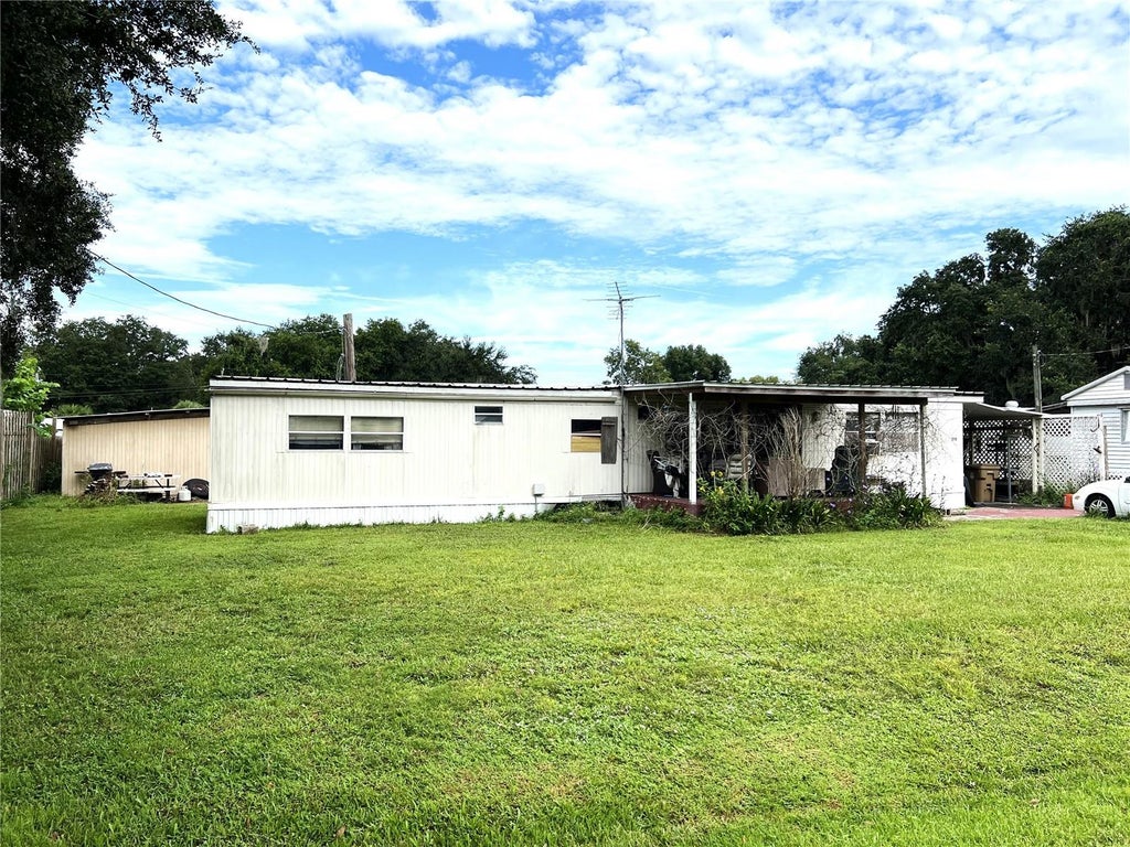Photo of 170 N Oak Drive, Kenansville, FL 34739 (MLS # S5156112)