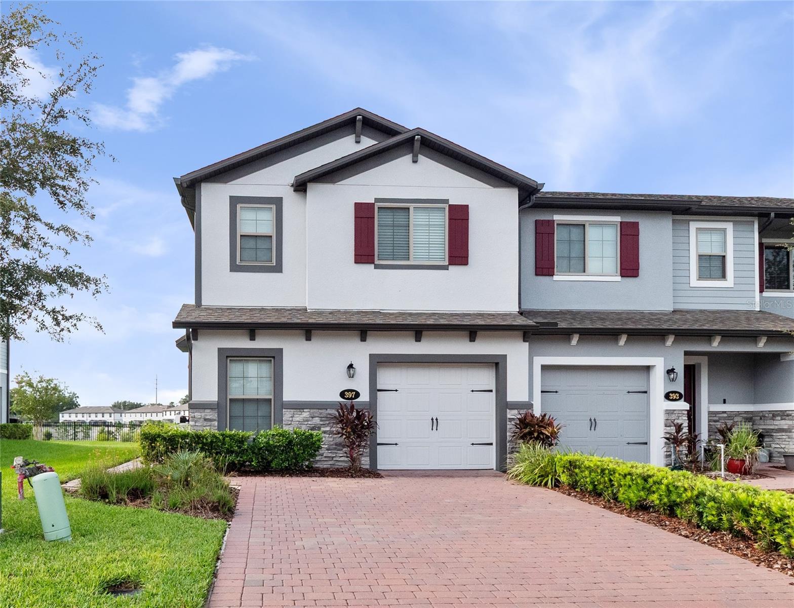 This Beautifull 2022 Townhome is a 4 Bedroom, and 3 Bathroom is a "Florida Contemporary" Style. The first floor includes a large open concept great room/kitchen combination with "Wood plank" tile throughout. The kitchen is equipped with a center island, granite countertop in kitchen & quartz countertops in bathrooms, crown molding 42" cabinets, subway tile kitchen backsplash and stainless-steel appliances (Fridge, dishwasher, over the range microwave and range). A convenient full bath is located just off the great room and adjacent to a private first floor bedroom. There is access from the great room sliding glass door to the concrete patio offering additional outdoor living space where you can enjoy sunrises and sunsets also a walking/biking trail located just steps away from the back patio. The second floor oversized Master suite has ample room for larger furnishings, walk-in closet and adjoining master bath featuring double sinks, quartz countertops and large walk-in shower. 2 bedrooms are located towards the rear of the home and share a full bath. The second-floor loft makes a great entertainment area or home office space. Please call today and make your appointment!