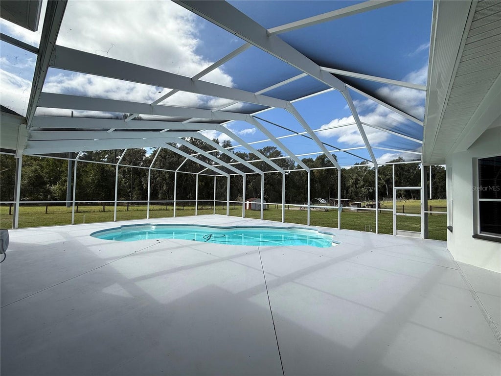 Photo of 25406 Ladyhawk Lane, Brooksville, FL 34601 (MLS # TB8540624)