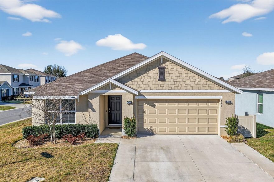 Newly built with many upgrades! No carpet in the home, new modern ceiling fans in all the bedrooms, added cabinets in the laundry room, glass shower enclosure, screened in Florida room with a privacy shade, epoxy floor in garage, added shelving in garage, insulated garage door, MY Q smart garage opener, IQ Panel smart home features, outlet for Tesla charger, Google Nest doorbell camera, Honeywell home thermostat, new deep kitchen sink, vinyl fencing, extra fencing with poured slab to hide trash receptacle, rock around landscaping, outside surveillance cameras, irrigation system 3 zone wired for a 4th zone, widened driveway, and so much more! This home has a shower in the extra large primary bath, dual sinks, a separate enclosed room for the toilet, and bath shower combo in guest bath. The chef's kitchen has an extra large pantry, an island and eat in space in the kitchen. This community has all underground utilities, fiber for internet, street lights, large green space, and playground all with a low HOA Fee. Just minutes for The Villages, Florida and all the restaurants, shopping, and medical facilities that The Villages offer. Come tour this lovely home, It is one to see!