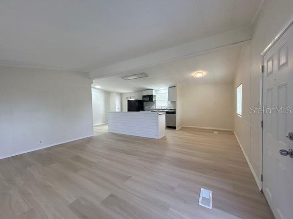 Photo of 7110 Commons Boulevard, Port Richey, FL 34668 (MLS # TB8494663)