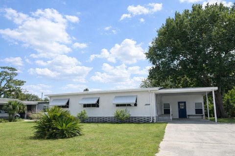 Photo of 7110 Commons Boulevard, Port Richey, FL 34668 (MLS # TB8494663)