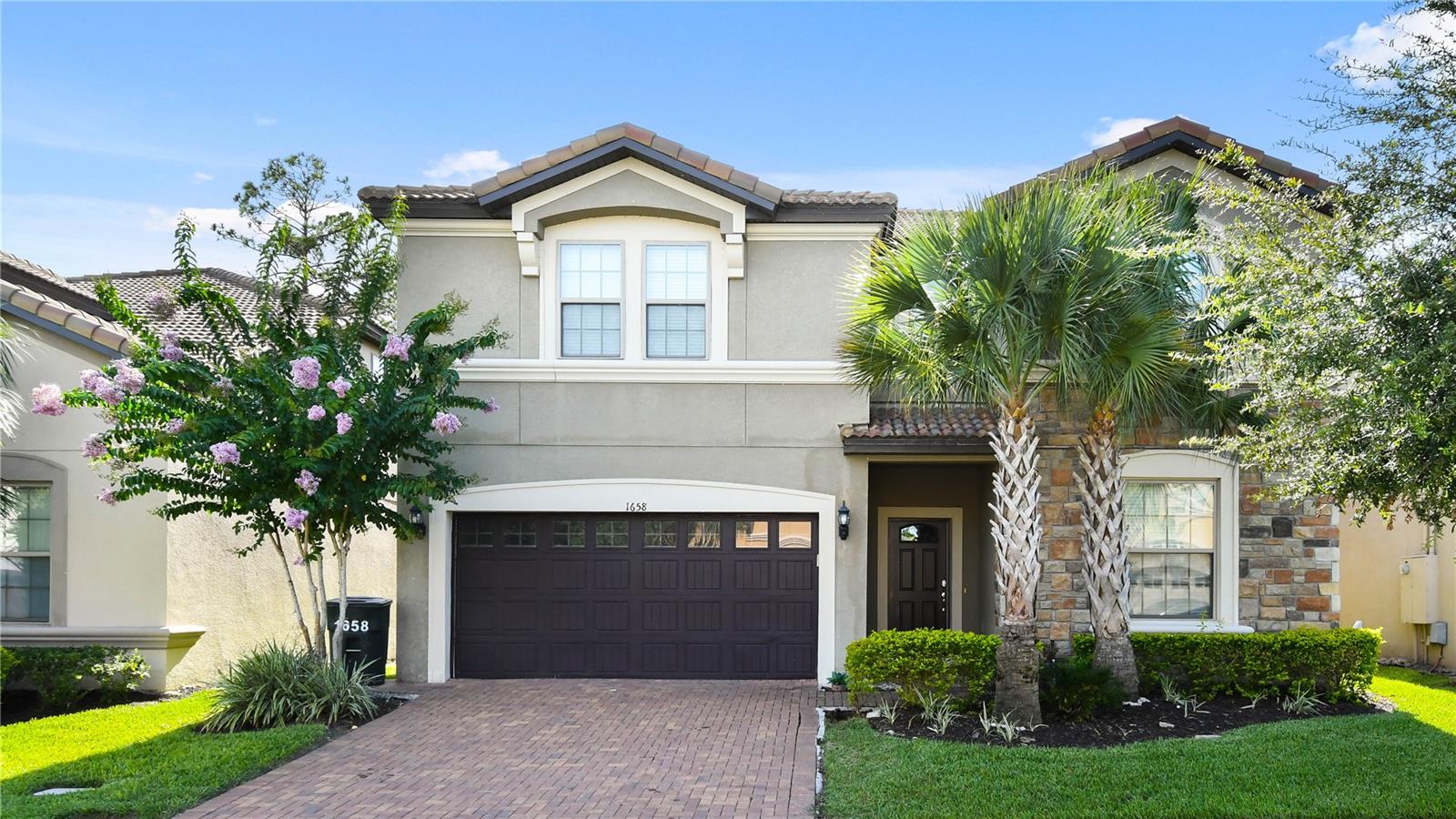 Stunning 9-bedroom, 6-bathroom pool villa with a private game room, located in the highly desirable Windsor at Westside resort community in Kissimmee. This spacious home features a bright, open floor plan with multiple living areas, including a loft with air hockey, foosball, and pool table—perfect for family entertainment or relaxing with guests. The fully equipped kitchen opens to a large dining area and breakfast bar, ideal for both everyday living and hosting. Step outside to a covered lanai with outdoor dining space, resort-style pool, and spa for year-round enjoyment. Bedrooms are thoughtfully designed with themed rooms, en-suite bathrooms, and ample storage. Residents have access to exceptional resort amenities including a 10,000 sq. ft. clubhouse, lagoon-style pool with lazy river, splash park, tiki bar, arcade, volleyball and sports courts, and a modern fitness center. Conveniently located just minutes from Disney parks, restaurants, and shopping. Monthly rent payments are reported to all three major credit bureaus, offering tenants an opportunity to build credit. This is a rare opportunity to own a luxury home in one of Central Florida’s most sought-after gated communities.
