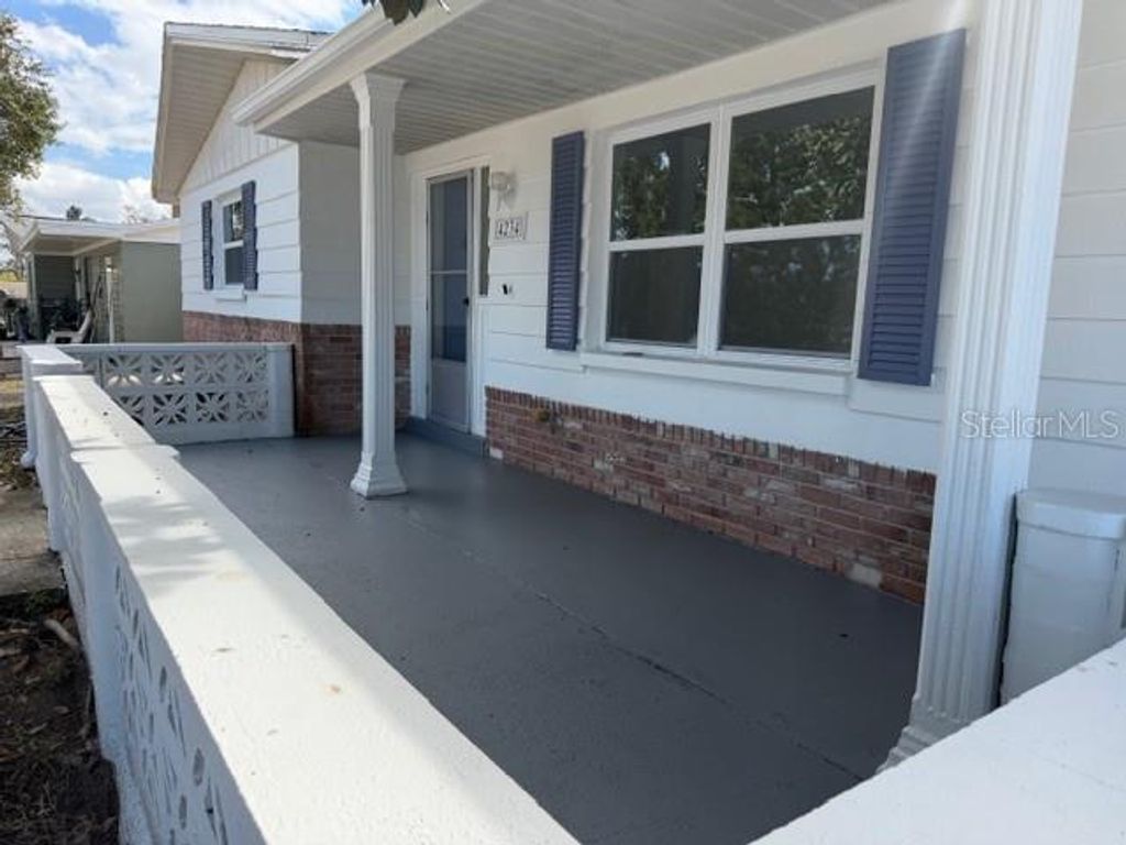 Photo of 4234 Ridgefield Avenue, Holiday, FL 34691 (MLS # TB8483761)