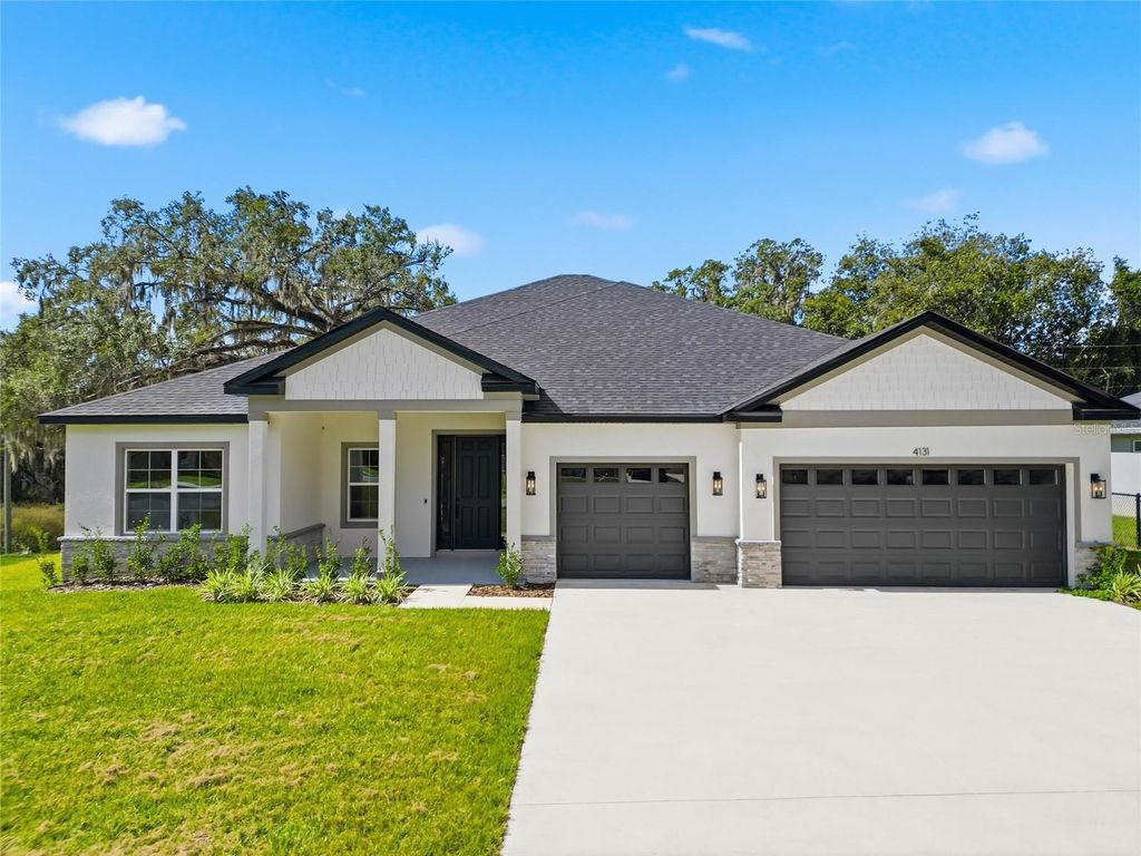 Photo of 4131 SW 130th Loop, Ocala, FL 34473 (MLS # O6355679)