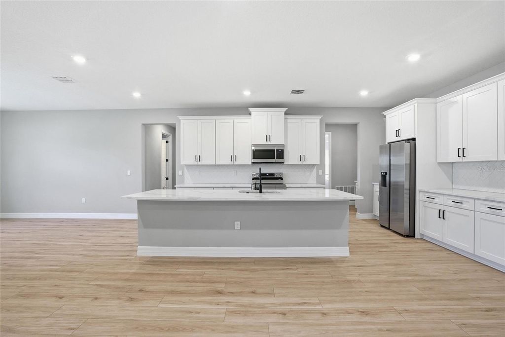 Photo of 4131 SW 130th Loop, Ocala, FL 34473 (MLS # O6355679)