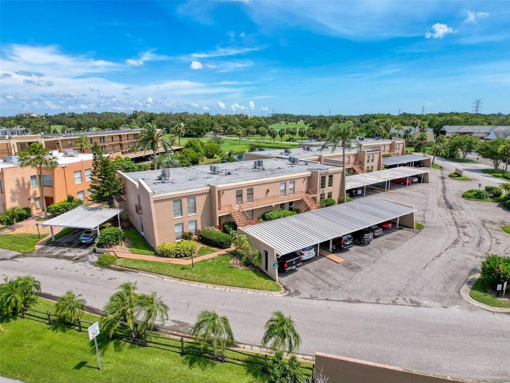 Photo of 225 Country Club Dr #A203, Largo, FL 33771 (MLS # W7877222)