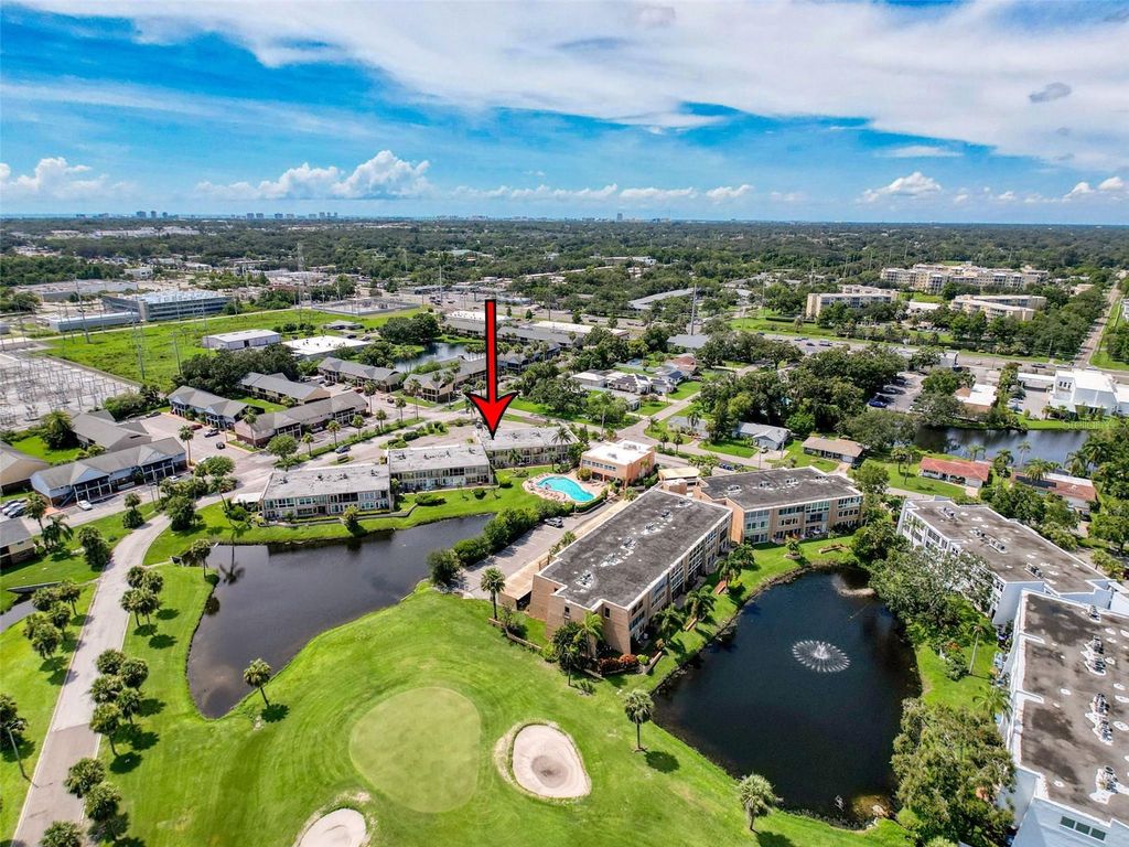 Photo of 225 Country Club Dr #A203, Largo, FL 33771 (MLS # W7877222)