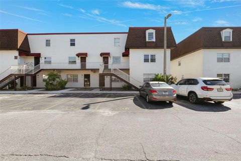 Photo of 9009 Tudor Drive #G210, Tampa, FL 33615 (MLS # TB8445372)