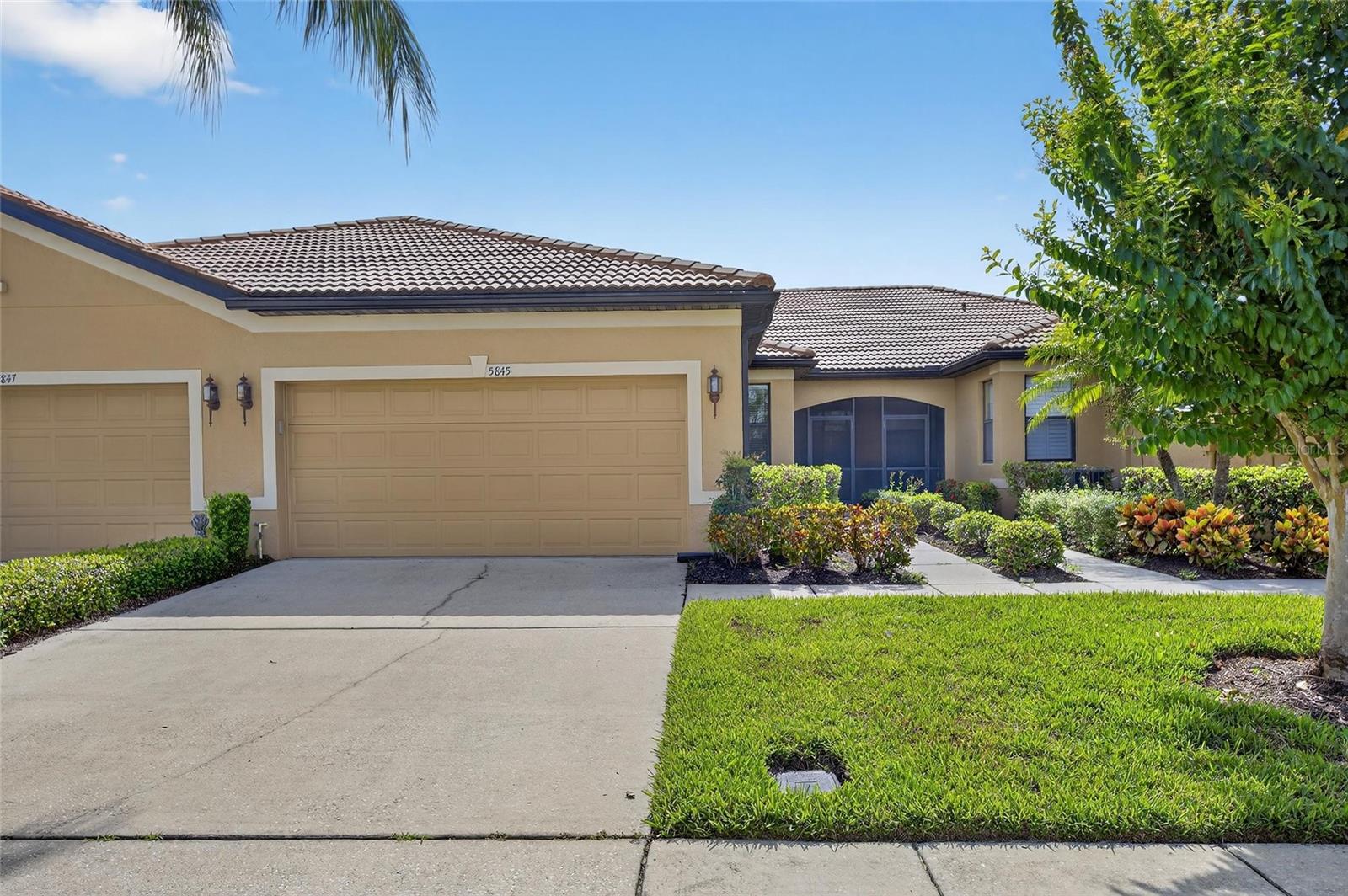 55+ Community.... Your home search is over! Beautiful, impeccably maintained low maintenance 2 bed, 2 bath with EXTRA bonus room (den/office) villa in the sought after 55+ Del Webb Community of Southshore Falls. Enjoy your morning coffee or perhaps an evening beverage from the privacy of your screened lanai which overlooks a quiet natural expansive landscaped area. Enter this freshly painted (July 2025) in neutral color beautiful home through a screened porch, into a light & bright foyer custom with designed tiled flooring, Home boasts an eat-in kitchen, and additional breakfast bar, custom solid wood cabinets & pantry. Spacious dining & living room with ceiling fans and 18 inch title. Huge master bedroom with spacious walk in closet. Oversized bathroom with double vanities & glass walk-in shower enclosure. Spilt bedroom plan so plenty of privacy for overnight guests. Screens on front door, garage & patio which allows for a wonderful cross breeze. Included is the lease is interior water, Landscape maintenance including reclaimed water irrigation, mowing, weeding, fertilization, exterior pest control and tree and shrub trimming. 24/7 gated & guarded entrance, The villas is located just a short walk or bike ride to the 14,000 sq ft Clubhouse 2 Swimming pools, resistance pool, Hot tub/spa, state-of-the-art Fitness center, Bocce ball, Tennis & Pickle ball courts, Library/Game/Card room, Billiard room, an Arts/Craft room, Internet Cafe, & a Nature trail, Schedule an appointment to view, you will not be disappointed.