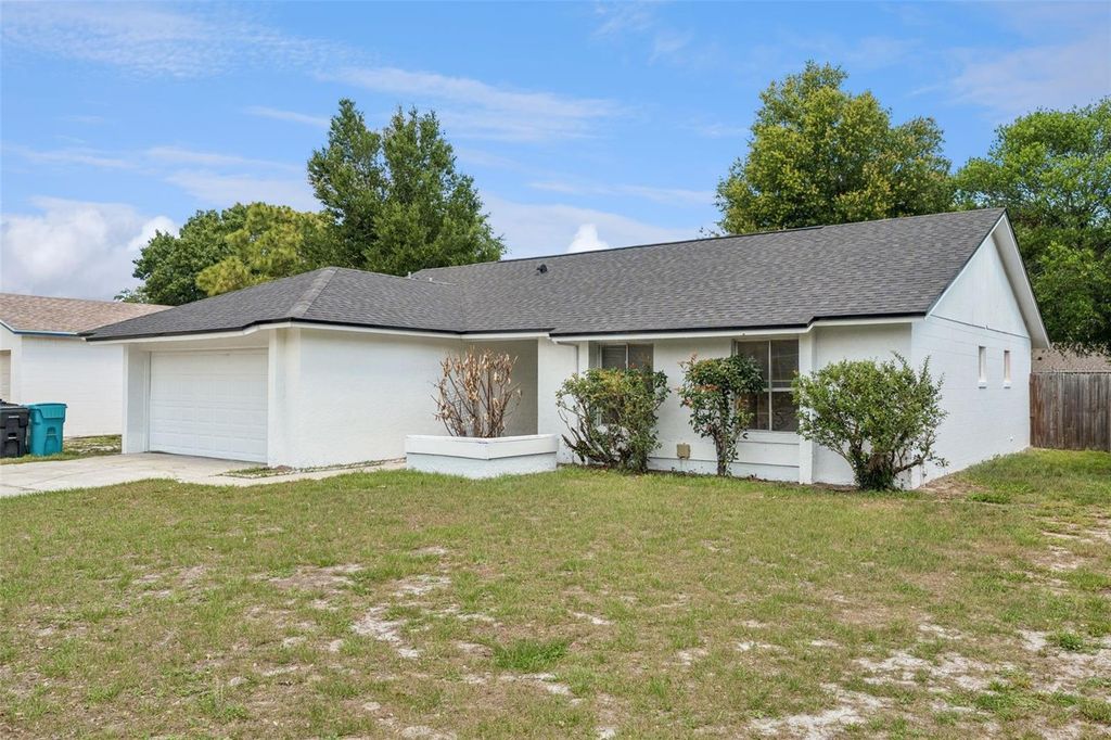 Photo of 4711 White Willow Lane, Orlando, FL 32808 (MLS # O6408931)