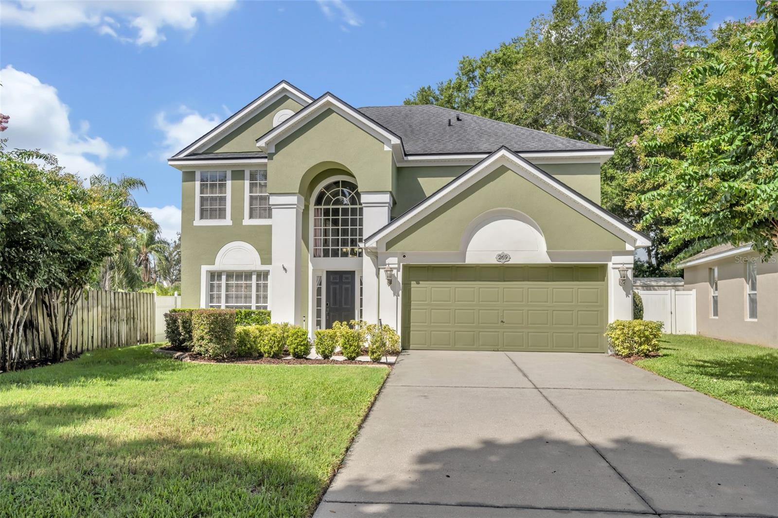Impressive, Immaculate, and Move-In Ready!
Welcome to 269 Hanging Moss Circle, where exceptional curb appeal—highlighted by a freshly painted exterior (2022) and an extended driveway—sets the tone for this beautifully maintained home. Step inside and be welcomed by soaring ceilings and an abundance of natural light that fills the formal living and dining rooms complete tile flooring throughout first level.
The cheerful kitchen features updated stainless steel appliances and a bright breakfast nook that opens seamlessly into the spacious family room and your own private backyard oasis. Relax or entertain under the large screened lanai overlooking the renovated pool (2024) with new finish and tile—surrounded by lush landscaping on an oversized lot.
Upstairs, the expansive primary suite offers a tray ceiling, spa-style bathroom with dual vanities, garden tub, separate shower, and a generous walk-in closet. Two additional bedrooms, a full bath, convenient upstairs laundry, and a versatile loft—perfect for a home office, playroom, or fitness space—complete the second level.
Additional highlights include:
• New water heater (2024)
• New pool filter (2025)
• 2015 roof
• Updated garage door opener
• Nest system with 2 cameras, smart thermostat & door access
• Excellent location near shopping, I-4, and top-rated Lake Mary schools
Don’t miss this opportunity to own a truly special home—WELCOME HOME!