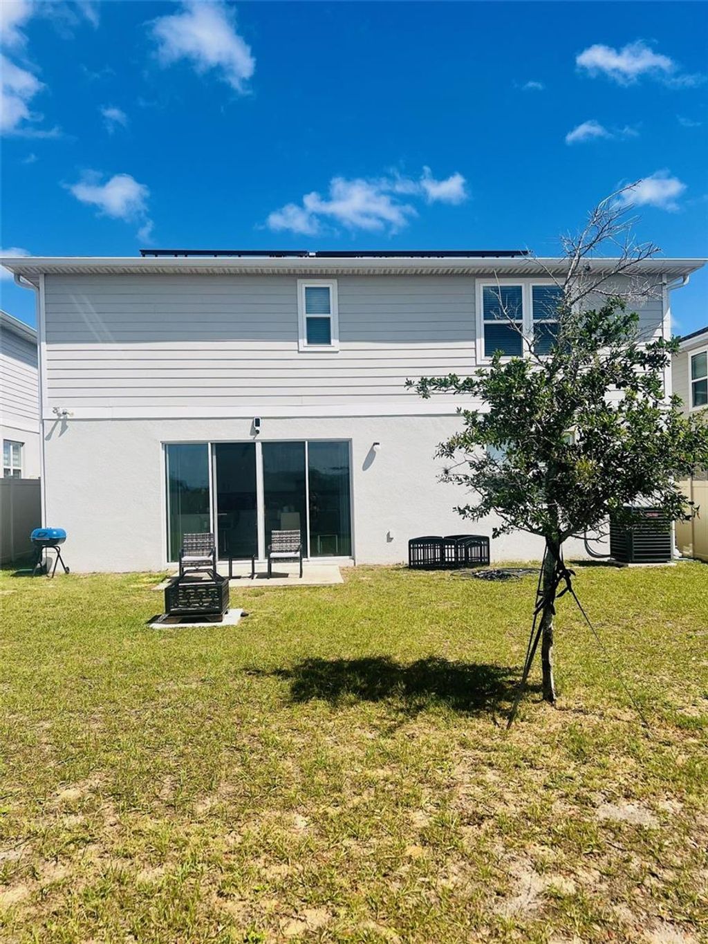 Photo of 1120 Sugarwood Street, Davenport, FL 33837 (MLS # O6396693)