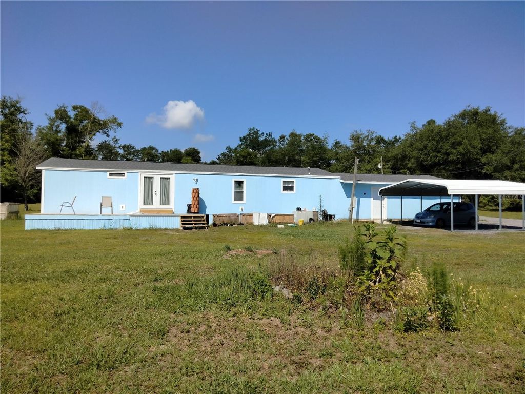 Photo of 3990 Whispering Pines Circle, Greenwood, FL 32443 (MLS # O6353308)