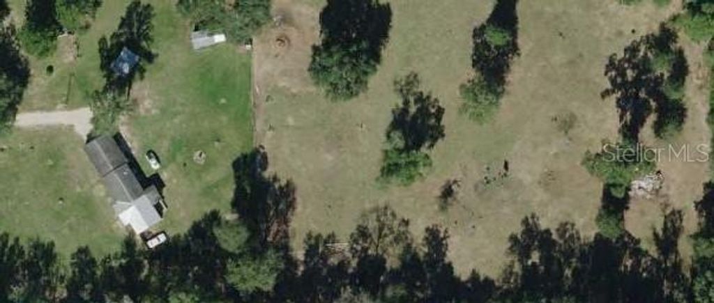 Photo of 3990 Whispering Pines Circle, Greenwood, FL 32443 (MLS # O6353308)