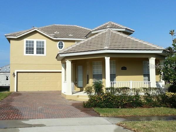 Discover this spacious, light-filled residence in the sought-after Independence neighborhood of Winter Garden. Located just minutes from Disney World, sleek shopping, dining venues, and excellent schools, it offers the ideal balance of comfort and convenience.
Key Features:
Generous layout: 4 bedrooms (including a guest suite on the main level), 3.5 baths, separate formal dining, elegant foyer, inside laundry, and soaring vaulted ceilings.
Inviting curb appeal: Charming covered front porch—perfect for morning coffee.
Upgrades throughout: Durable tile on the main floor, hardwood-laminate upstairs, and an exterior fresh coat of paint.
Well-appointed kitchen: Ample counter space, cabinetry, and modern appliances (dishwasher, range/oven, and refrigerator included).
Comfortable living areas: Spacious family and living rooms ideal for gatherings.
Peaceful backyard living: Enjoy serene views and relaxed evenings outdoors.
Functional amenities: Two-car attached garage, central HVAC, and forced-air heating.
Community Amenities: cable and internet, 2 community pools, play areas, a lg community park, 2 dog parks, tennis & basketball courts, main clubhouse w arcade, fitness & 2nd clubhouse both w fitness rm & billiards, 10' walking/biking path thru-out Independence, 2 private boat ramps & community events thru-out the year