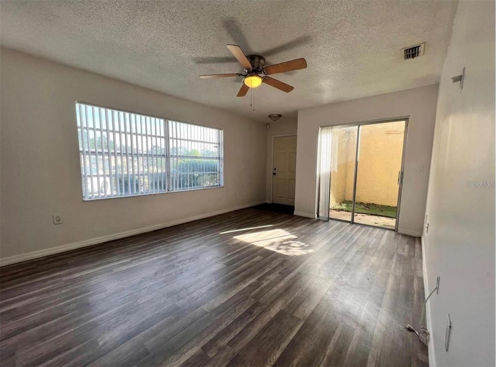 Photo of 1089 Woodman Way, Orlando, FL 32818 (MLS # O6375188)