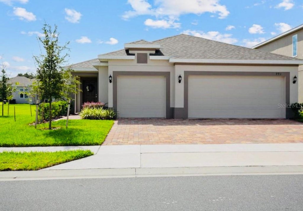 Photo of 991 Benjamin Trail, Davenport, FL 33837 (MLS # O6454031)