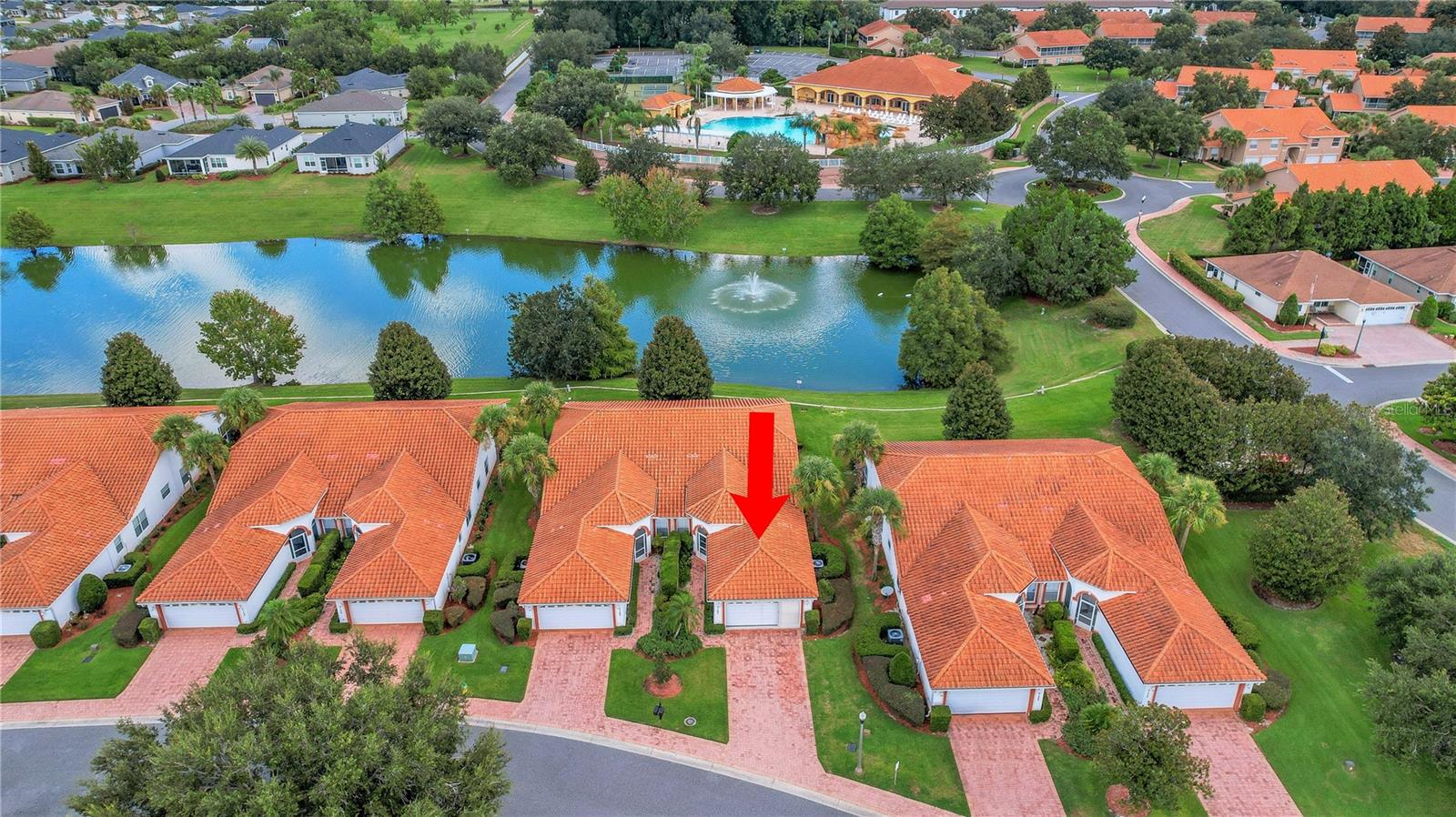 WATERFRONT RESORT STYLE LIVING! NON-AGE-RESTRICTED 3Bed/2Bath/2Car Garage Block/Stucco 1768 SqFt heated Home with no bond or CDD fees in gorgeous & sought after Lakeside Landings! Located around the corner from The Villages, The Charter School, tons of shopping, Restaurants, Doctors, Walgreens/CVS and more. This home features a bright and airy open floor plan, white kitchen cabinets, Stainless Steel Appliances, and vaulted ceilings. Other great features include the HOT WATER HEATER (2020), AIR-CONDITIONING UNIT (2016) and Roof is a TERRACOTTA TILE ROOF. In the master en-suite, you'll find double sinks, a walk in shower and soaking tub. On the enclosed lanai, sit back, relax and enjoy the water view and illuminated fountain. The HOA covers complete lawn care, mulching, irrigation, exterior pest control, power washing, and exterior painting. This gated community offers a 13,000 sq ft clubhouse with fitness center, billiards and card room, library and banquet hall. Outside includes 2 pools, one is a huge RESORT STYLE pool with water features, spa, cabana, putting green, tennis courts and pickleball. Lake area has a community beach with a dock. Call and make arrangements to see this great home today.