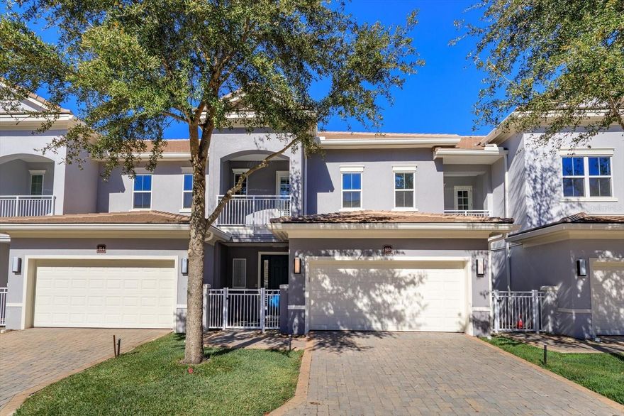 LUXURY 2 STORY TOWNHOME in Grande Oaks at Heathrow with 3 BEDROOMS, 3 1/2 BATHS, 2 CAR GARAGE, TWO PATIOS and a Balcony. The Willow Model is one of only 25 homes in this 314 home community with the PRIMARY BEDROOM DOWNSTAIRS!  SELLER PAID 1 YEAR HOME WARRANTY!  Community Association Construction Project on this building completed.  NEW WINDOWS SECOND FLOOR, ROOF, STUCCO, EXTERIOR PAINT, BALCONY, GUTTERS/DOWNSPOUTS, PATIO FENCING, OUTDOOR LIGHTING and NEW LANDSCAPING.  Great Time to Purchase!  Pavers grace the driveway and front patio. The generous foyer has a large storage closet with window and convenient access to the garage and Ground Floor Laundry with Cabinets and Utility Sink. An OPEN KITCHEN/DINING/LIVING AREA amazes with CUSTOM CURTAINS/AUTOMATIC SHADE for Slider, EXPANSIVE WINDOWS, with SLIDERS leading to a PAVERED PATIO. The Upscale Kitchen includes BREAKFAST BAR, CLOSET PANTRY with Built-In Wood shelving, 42" WOOD CABINETS, STAINLESS STEEL APPLIANCES, SUBWAY TILE BACKSPLASH, and SOLID SURFACE/GRANITE COUNTERS.  REFRIGERATOR replaced in 2022, WATER HEATER in 2024, WASHER & DRYER in 2021, and PRIMARY BEDROOM  CARPET 2024.  ALL BEDROOMS feature WALK-IN CLOSETS and EN-SUITE BATHS. THE GROUND FLOOR MASTER is spacious with a TRAY CEILING and CALIFORNIA CLOSETS. The Primary Bath has Large Shower, 2 Separate Granite Vanities, and Separate Toilet Closet.  The 2nd level hall leads to a COVERED BALCONY with MOTORIZED SCREEN. The 2nd level LOFT provides for work/study/leisure activities and more closet storage.  Other features, ALARM SYSTEM, integrated SMOKE DETECTORS, IN-WALL PEST CONTROL SYSTEM,
CEILING FANS, WOOD SHELVING IN ALL CLOSETS except one, GRANITE COUNTERS IN ALL BATHS, and PLANTATION SHUTTERS throughout the home!  The Garage has OVERHEAD STORAGE, EPOXY FLOORING, TESLA CHARGER, OUTDOOR KEY PAD and WHOLE HOUSE REVERSE OSMOSIS SYSTEM.  GRANDE OAKS AT HEATHROW is located in the most sought out NORTHWEST CORNER of SEMINOLE COUNTY. Desirable HEATHROW location. Short drive to I-4, 417 and 429. Walk to COLONIAL TOWNPARK shopping center to watch a movie, dine at one of the numerous restaurants or enjoy a day of shopping. Drive 50 minutes or less to one of the near by beaches, one of the numerous amusement parks or sport venues. Neighborhood amenities include CLUBHOUSE, COMMUNITY POOL, HEATED SPA, FITNESS CENTER, and TOT PARK.  Schedule a showing today to view this WELL-CARED FOR TOWNHOME with NUMEROUS UPGRADES!  This is TRULY UPSCALE CAREFREE LIVING AT IT'S BEST! Property may be under audio or visual surveillance!