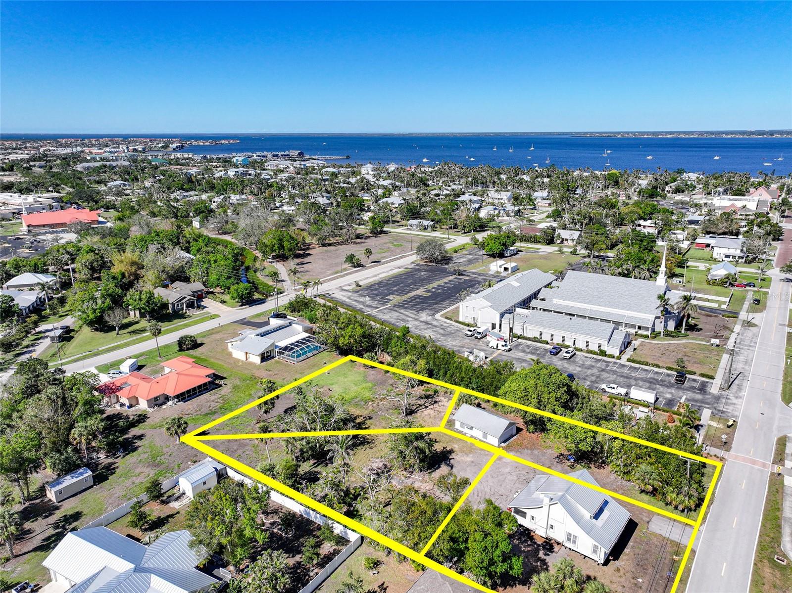 Prime Lot – A Rare Opportunity! Nestled near the heart of Punta Gorda’s charming historic district, this premium lot offers the perfect blend of heritage and modern convenience. Surrounded by picturesque streets, beautiful waterfront parks, and historic homes, this property is an ideal canvas for building your dream home or investment project. Enjoy walkability to downtown Punta Gorda’s vibrant dining, shopping, and entertainment, as well as easy access to Fishermen’s Village, the Harborwalk, and local marinas. With no HOA restrictions and city utilities available, this lot provides flexibility and potential in one of Southwest Florida’s most sought-after locations. Opportunities like this don’t come often—secure your place in Punta Gorda’s rich history today!