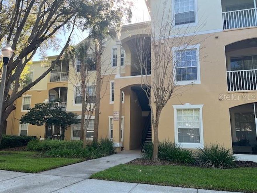 Welcome home to well-kept, freshly painted first-floor condo in the popular gated Stonebridge Place. A highly sought-after community in the heart of Metrowest offering resort style living with community pool, walking paths, fitness center, lovely mature landscape & secured gate access. LOCATION!! Community is very short distance to all major roads, theme parks, downtown, amenities, highly rated schools, medical facilities, Mall at Millenia, COSTCO, airport and more.  This first-floor home in a NON-ELEVATOR building features a low-maintenance lifestyle. Light & bright, quiet & private, this well laid out 1400+sqft split plan 3-bedroom, 2-bath unit featuring spacious rooms with walk-in closets, indoor laundry area, ceiling fans, screened in patio overlook green, assigned parking & single owner!