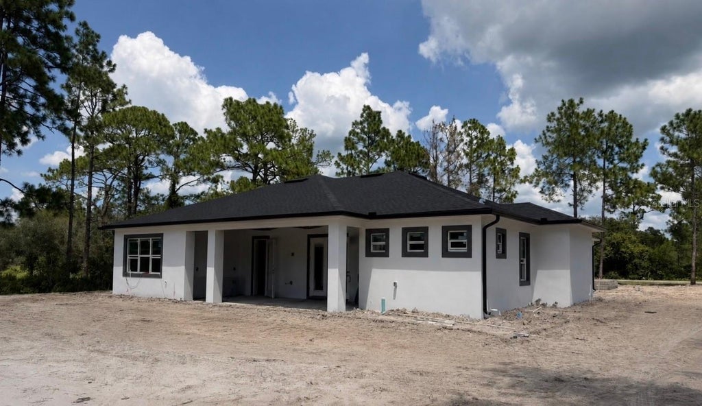 Photo of 40401 Royal Trails Road, Eustis, FL 32736 (MLS # O6434052)