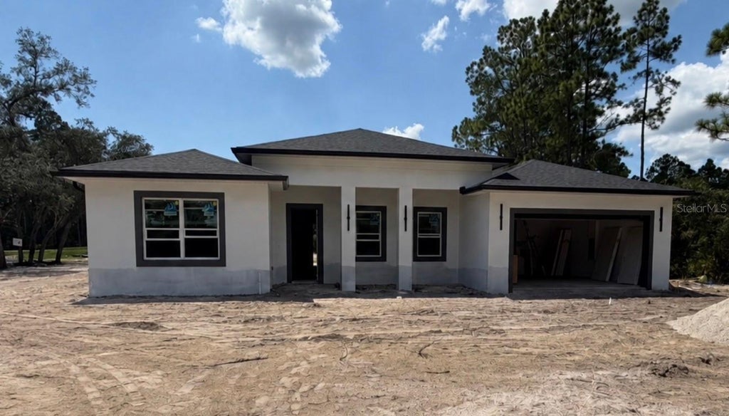 Photo of 40401 Royal Trails Road, Eustis, FL 32736 (MLS # O6434052)