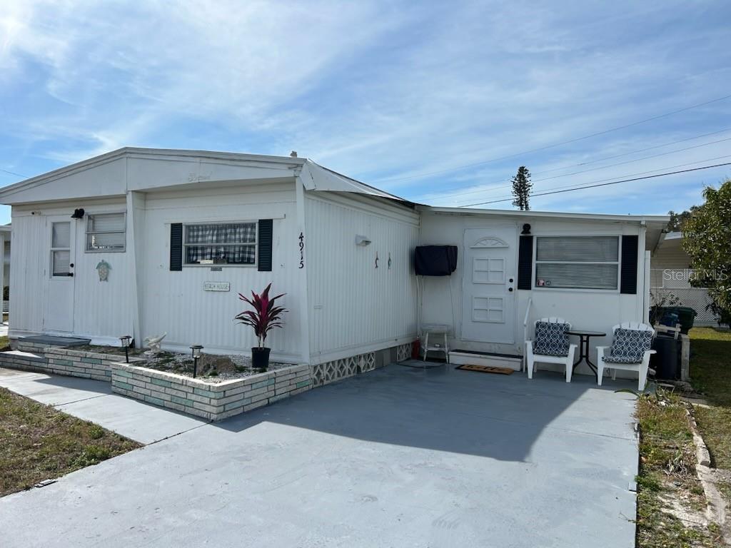 Affordable home in popluar Tri Par Estates, in the dog section. 2022 updates; water heater, dishwasher, some new ceiling fans & lights, some new flooring & paint. Home was tented in 2024. Buyer will be responsible for installing carport after closing & need to talk with Tri Par Estates regarding what is required. Tri-Par Estates is a 55+ community in which you own your home and the land. Park fee of $1,584.00 a year as part of the property taxes paid once a year, includes Frontier internet, cable also trash. There is a large pool, hot tub, mini golf, laundry facilities, fitness room, clubhouse, and many activities to enjoy. Just minutes to the airport and many other necessities nearby like hospitals, shopping, restaurants and more. Airplanes & jets do fly over Tri Par Estates.
